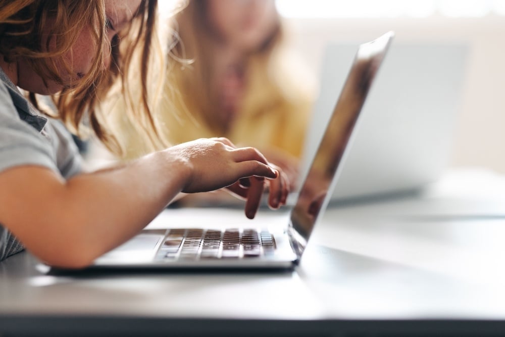 young-boy-using-laptop