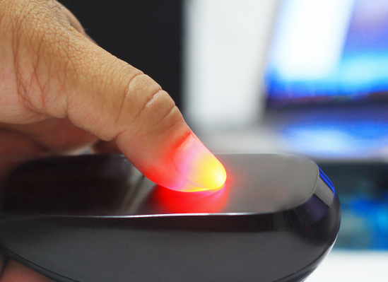 A doctor using biometric identification to successfully e-prescribe a controlled substance